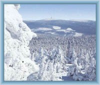 Sight of mountain Praděd from mountain Vozka