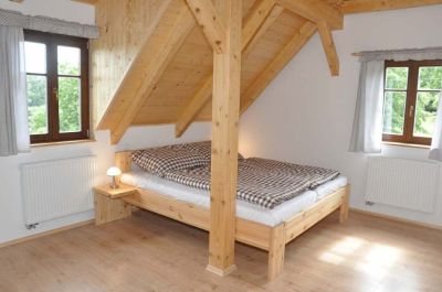 Timber cottage under Kozákov
