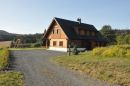 Timber cottage under Kozákov