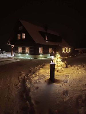 Timber cottage under Kozákov