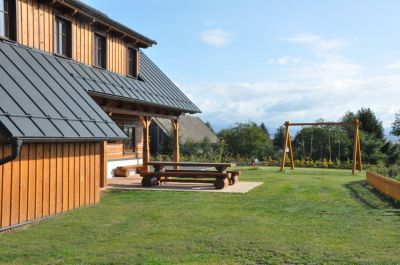 Timber cottage under Kozákov