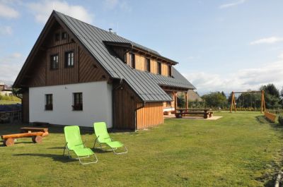 Timber cottage under Kozákov