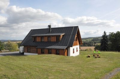 Timber cottage under Kozákov